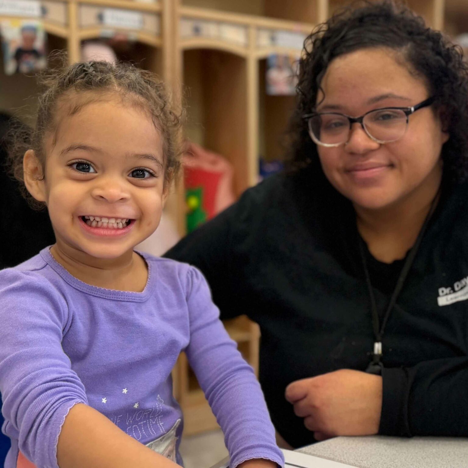 toddler-teacher-smile-header-nowell-square
